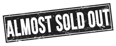 Siyah grungy dikdörtgen damga işareti üzerinde neredeyse satılmış metin.