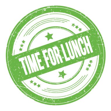 Yeşil yuvarlak, kirli doku damgası üzerine öğle yemeği zamanı..