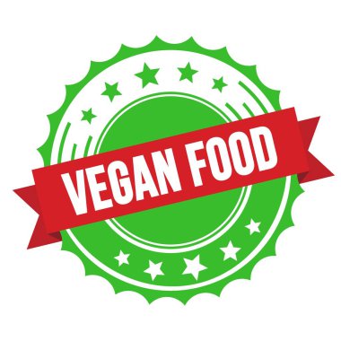 Kırmızı yeşil rozet damgalı VEGAN FOOD metni.