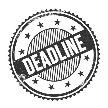 Siyah grungy zig zag kenarları üzerine yazılmış DeadLINE metni yuvarlak pul.