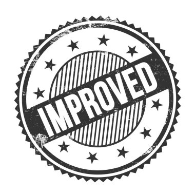 Siyah grungy zig zag kenarları yuvarlak pulu üzerine yazılmış IMPROVED metin.