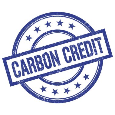 CARBON CREDIT metin mavi yuvarlak vintage kauçuk damga üzerine yazılmış.