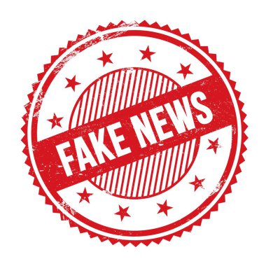 Kırmızı grungy zig zag kenarları yuvarlak mühür üzerine yazılmış SKE NEWS metni.