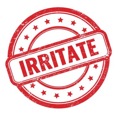 Kirmizi grungy vintage yuvarlak kauçuk damgalı IRRITATE metin.
