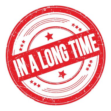 Uzun bir Time metninde kırmızı yuvarlak dokuma damgası üzerine.