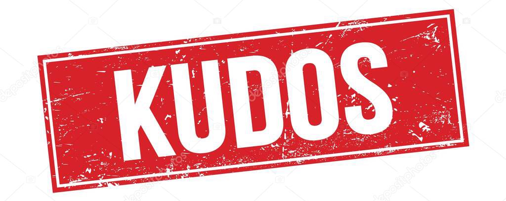 KUDOS text on red grungy rectangle stamp sign.