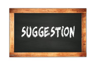 Siyah ahşap çerçeve okul tahtasına yazılmış SUGGESTION metin.