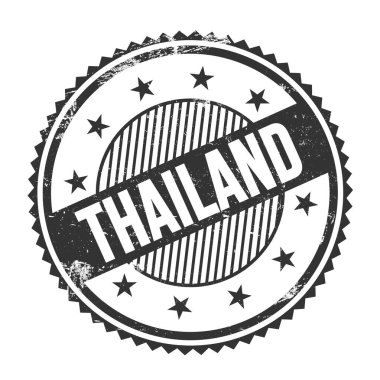 Siyah grungy zig zag kenarları üzerine yazılmış THAILAND metni yuvarlak pul.