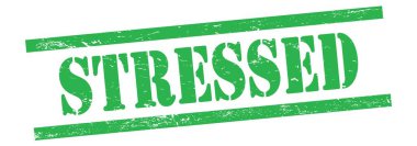 Yeşil grungy vintage kauçuk damga üzerinde STRESED metin.