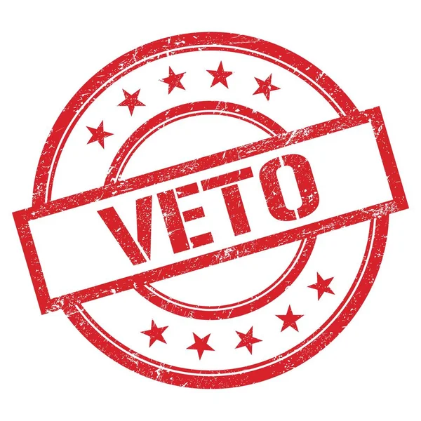 Kırmızı yuvarlak vintage kauçuk damgalı VETO metni.