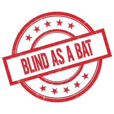 Kırmızı, yuvarlak, lastik damga üzerine yazılmış bir BAT metni.