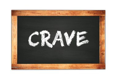 Siyah ahşap çerçeve okul tahtasına yazılmış CRAVE metni.