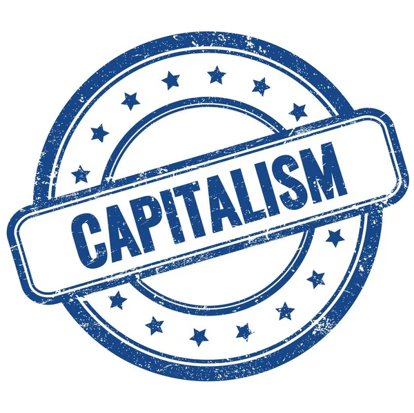 蓝色复古橡胶图章的Capitalism文本 — 图库照片