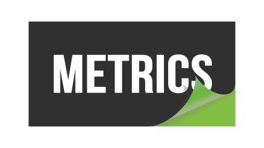 Siyah yeşil etiket damgası üzerine yazılmış METRICS metni.