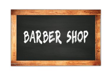 BARBER ShoP siyah ahşap çerçeve okul tahtasına yazılmış metin.