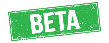 Yeşil grungy dikdörtgen damga işareti üzerine BETA metni.
