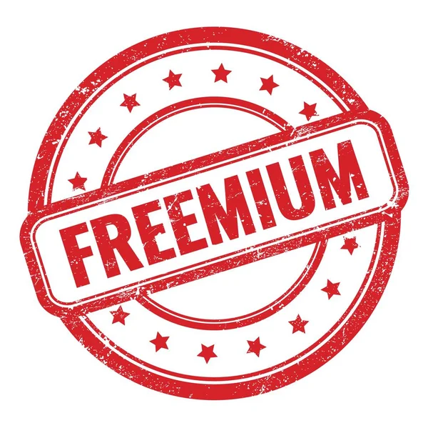 Текст Freemium Червоній Гранжевій Старовинній Круглої Гумовій Марці — стокове фото