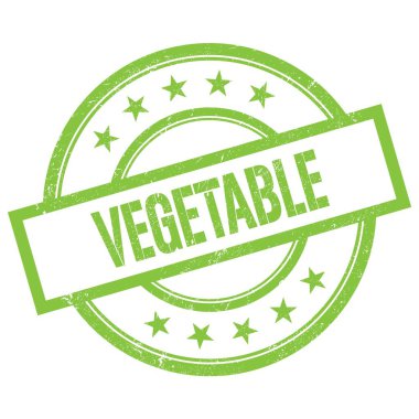 Yeşil yuvarlak vintage kauçuk damga üzerine yazılmış VEGETable metin.