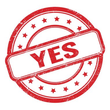 EVET metni kırmızı, kirli, eski, yuvarlak lastik damga üzerine.