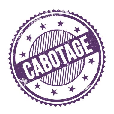 CABOTAGE metni mor indigo grungy zig zag kenarları yuvarlak mühür üzerine yazılmış.