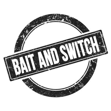 Siyah, pasaklı, yuvarlak, vintage damgalı BAIT ve Switch metni..