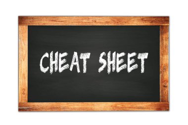 Siyah ahşap çerçeve okul tahtasına yazılmış KEAT SHEET metni.
