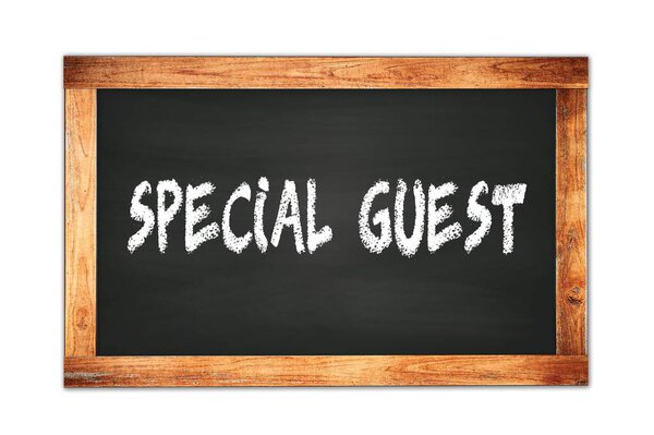 SPECIAL  GUEST text written on black wooden frame school blackboard.