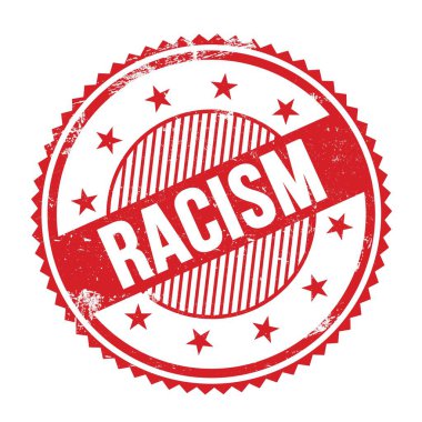 Kırmızı grungy zig zag kenarları üzerine yazılmış RACISM metni yuvarlak pul.