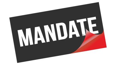 Siyah kırmızı etiket damgası üzerine yazılmış MANDATE metni.