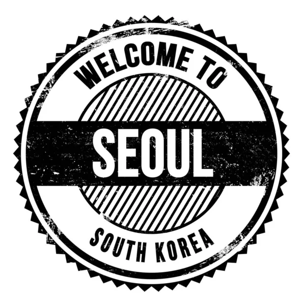欢迎来到Seoul 写在黑色锯齿状邮票上的字 — 图库照片