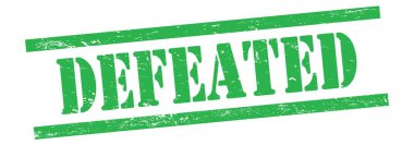 Yenilgiye uğratılmış yeşil, eski model lastik damga üzerine yazılmış metin.