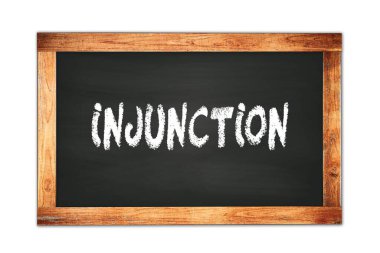 Siyah ahşap çerçeve okul tahtasına yazılmış INJUNCTION metni.