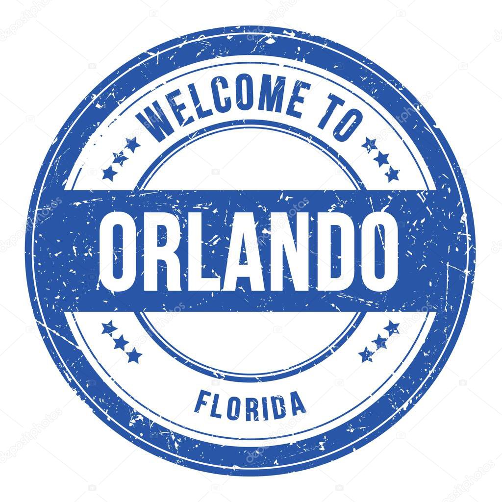 WELCOME TO ORLANDO - FLORIDA, words written on light blue round coin stamp