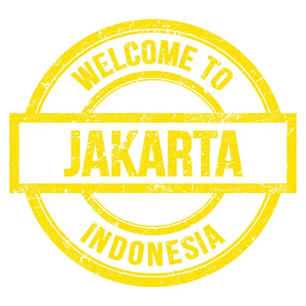欢迎来到日本 印尼语 用黄色圆圆的简单邮票书写 — 图库照片