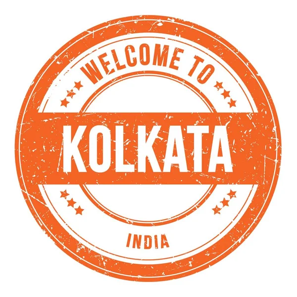 KOLKATA 'ya Hoşgeldiniz - Hindistan, turuncu yuvarlak bozuk para damgası üzerine yazılmış kelimeler