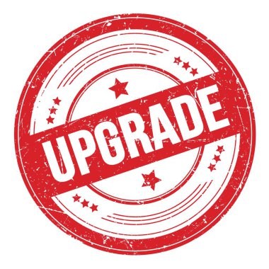 Kırmızı yuvarlak grungy doku damgası üzerine UPGRAD metni.