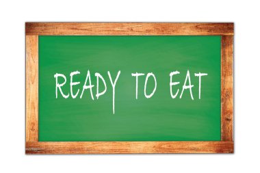 Yeşil ahşap çerçeve okul tahtasına yazılmış metni yemeye hazır.