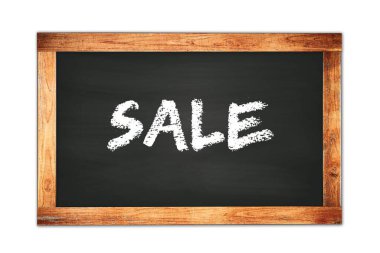 Satış metni siyah ahşap çerçeve okul tahtasına yazılmış..