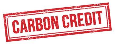 Kırmızı dikdörtgen işareti üzerine yazılmış CARBON CREDIT sözcükleri