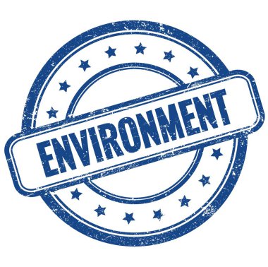 Mavili, eski, kirli, yuvarlak lastik damga üzerine ENVIRONMENT metni.