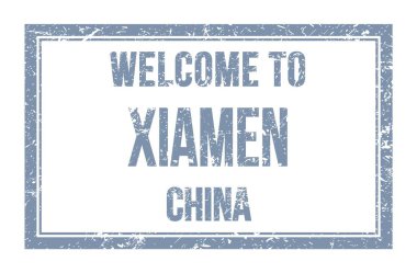 XIAMEN-ÇİN 'e Hoşgeldiniz, gri dikdörtgen posta pulunda yazan kelimeler