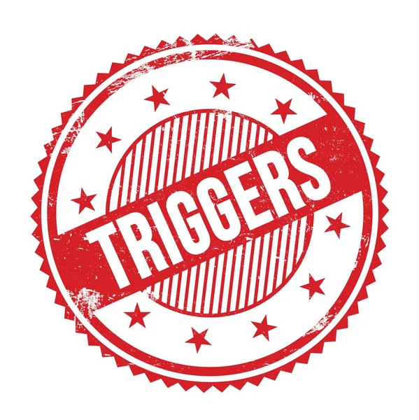 TRIGERS metin kırmızı grungy zig zag kenarları yuvarlak mühür.