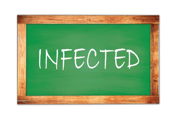 緑の木枠の学校の黒板に書かれた感染テキスト — ストック写真