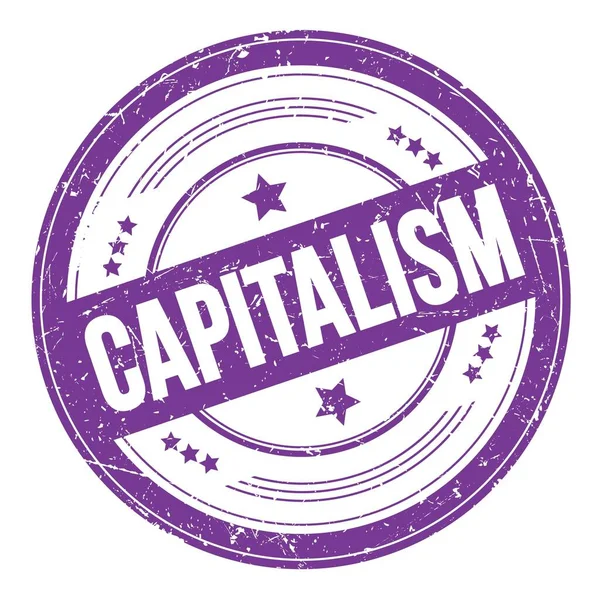 Capitalism Text Violet Indigo Grungy Texture Stamp — ストック写真