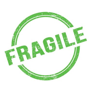Yeşil grungy vintage yuvarlak pulla yazılmış FRAGILE metni.