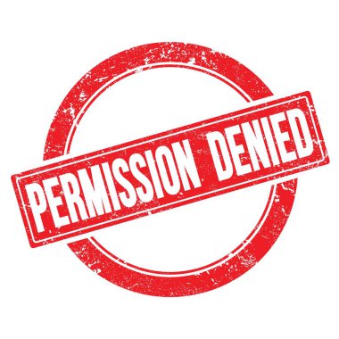 KÜZGÜRLÜK GÖREVLİ Koyu kırmızı, yuvarlak, eski pullu metin.