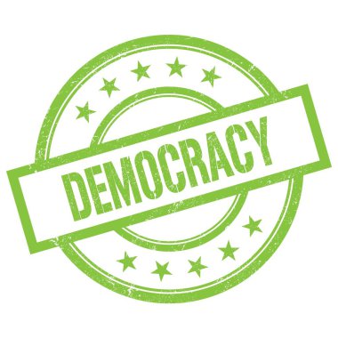 Yeşil yuvarlak vintage kauçuk damga üzerine yazılmış DEMOCRACY metin.