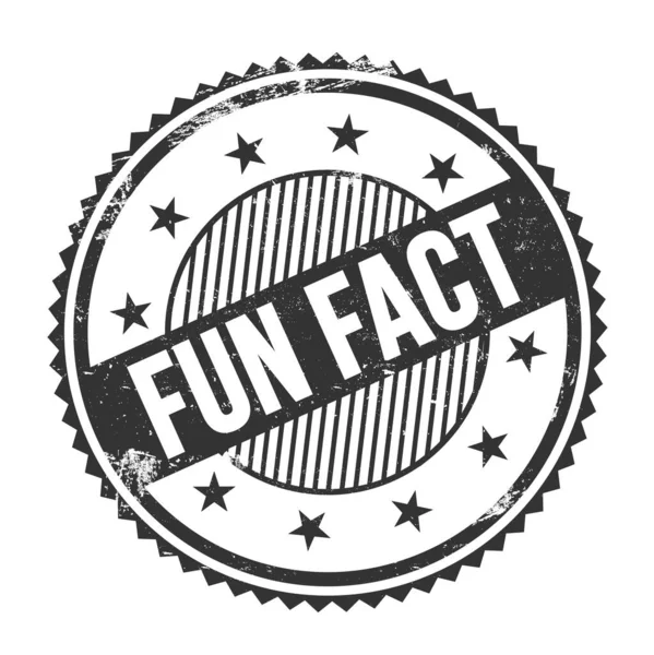 FUN FACT text written on black grungy zig zag borders round stamp.