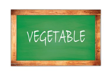 Yeşil ahşap çerçeve okul tahtasına yazılmış VEGETable metin.