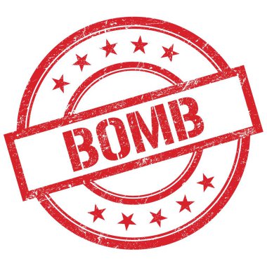 BOMB metni kırmızı yuvarlak plastik damga üzerine yazılmış.